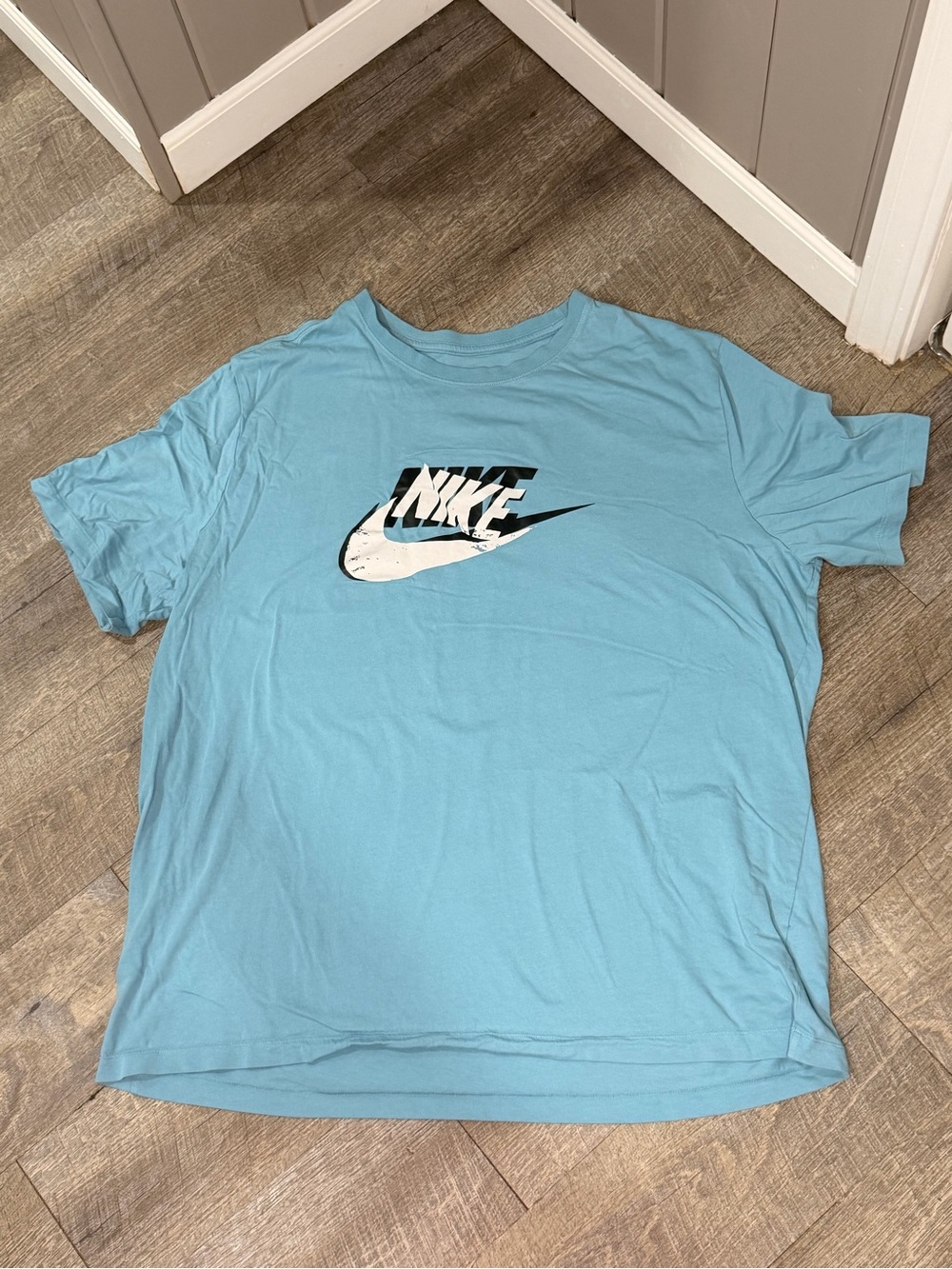 Nike Light Blue Short Sleeve Tee with Black & White Swoosh